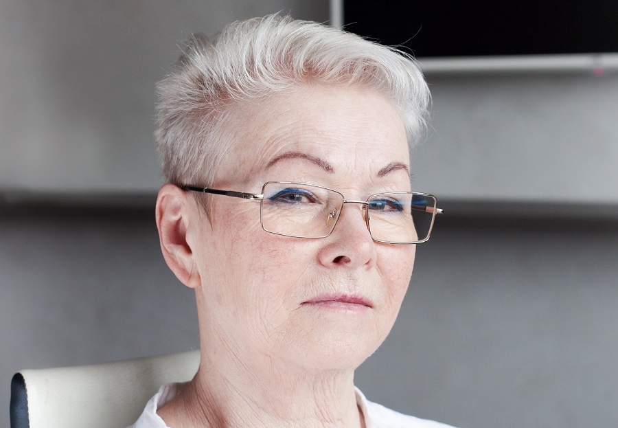 crop short grey hairstyle for women over 50 with glasses