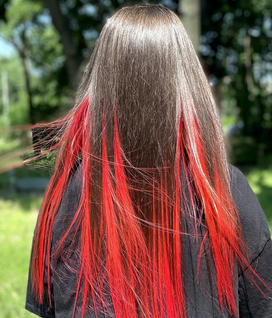 long dark brown hair with red streaks