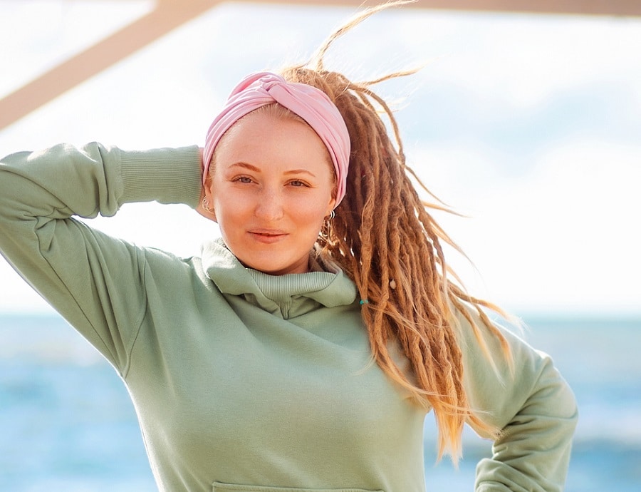 messy ponytail with dreads