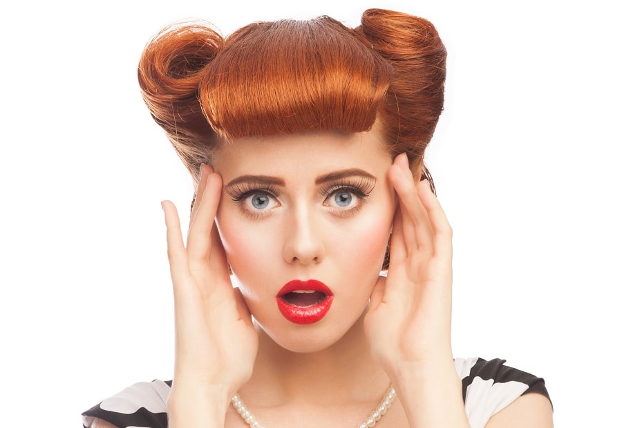 pin up hairstyle for red hair with bangs