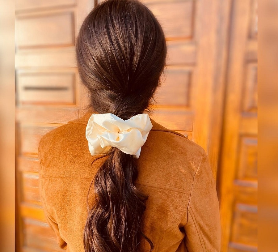braided ponytail with scrunchie