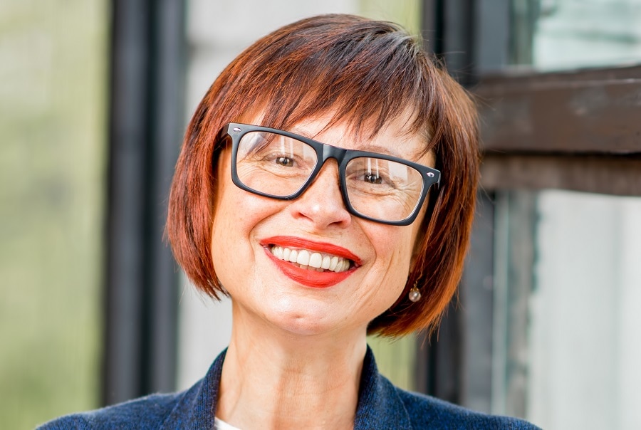 short bob with bangs for women over 50 with glasses