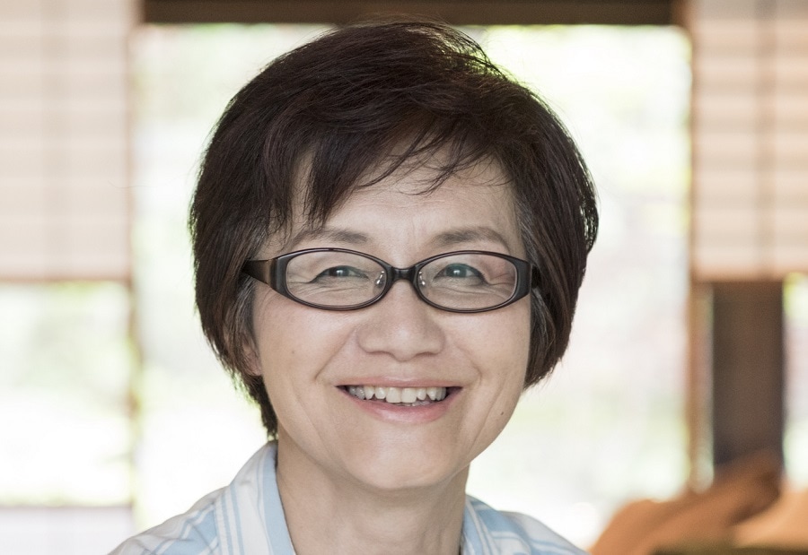 short hairstyle for Asian women over 50 with glasses
