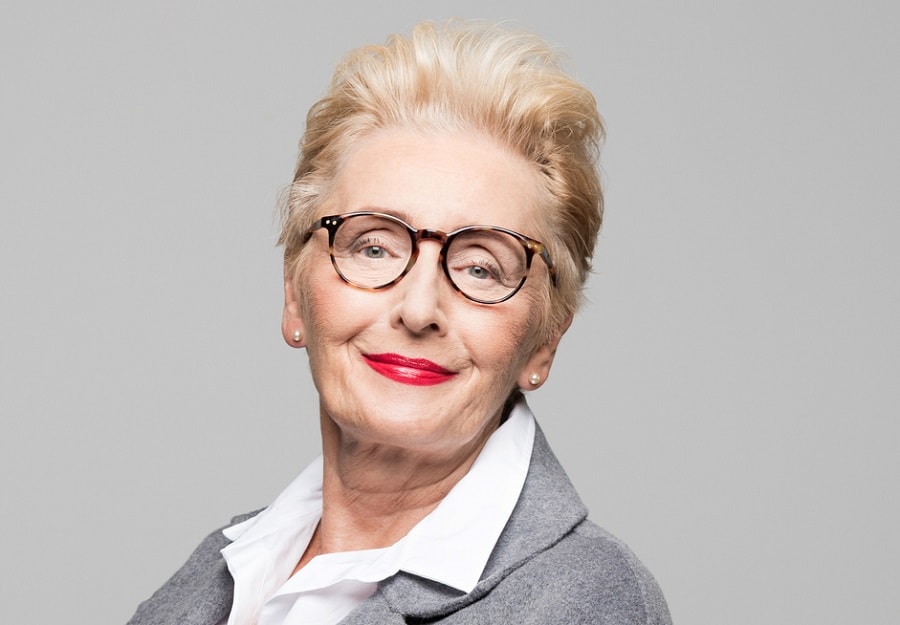 short slick back blonde hairstyle for over 70 with glasses