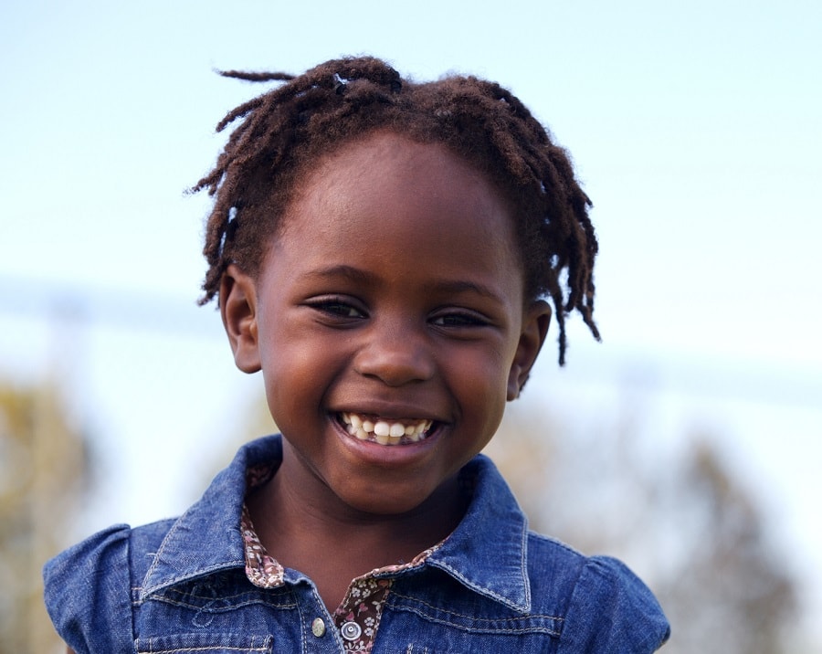 toddler girl with dreads