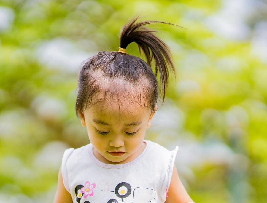 toddler girl with ponytail