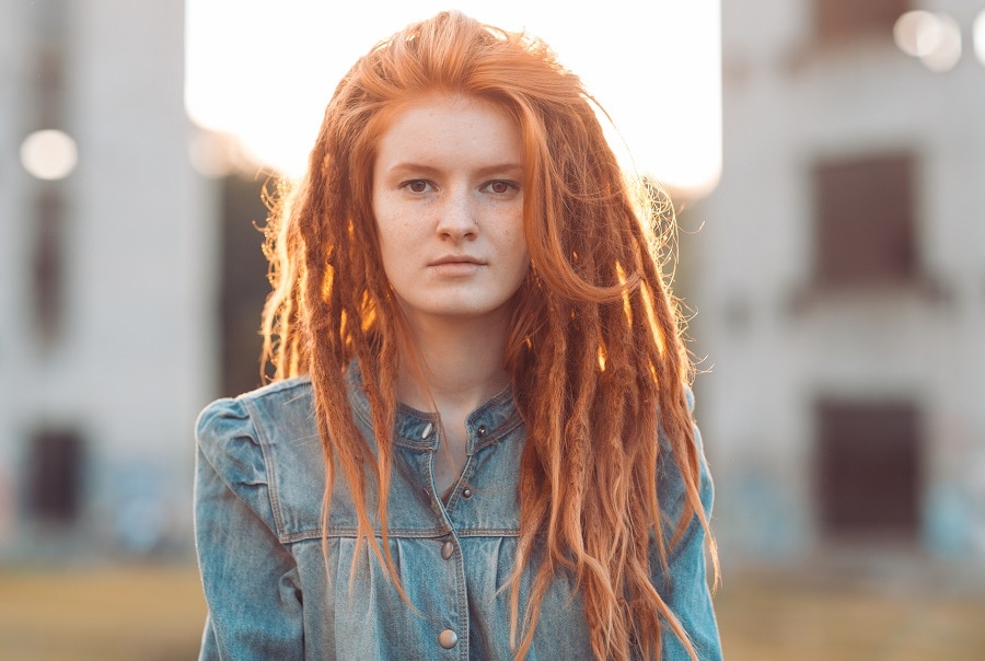 woman with long ginger red dreads