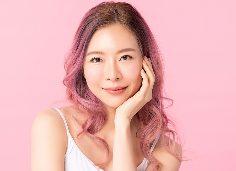 Asian woman with pink ombre hair