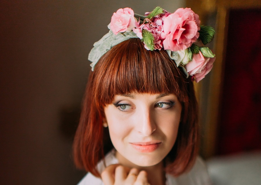 auburn red bob with thick bangs