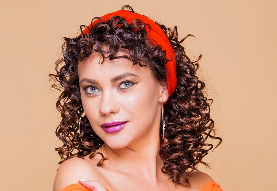 bandana hairstyle with curly bangs