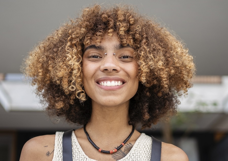 black girl with curly bangs