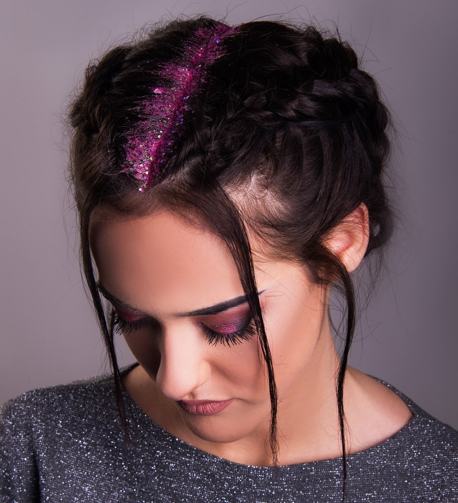 braided hairstyle with pink glitter roots