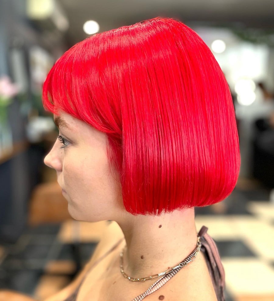 bright red bob with bangs