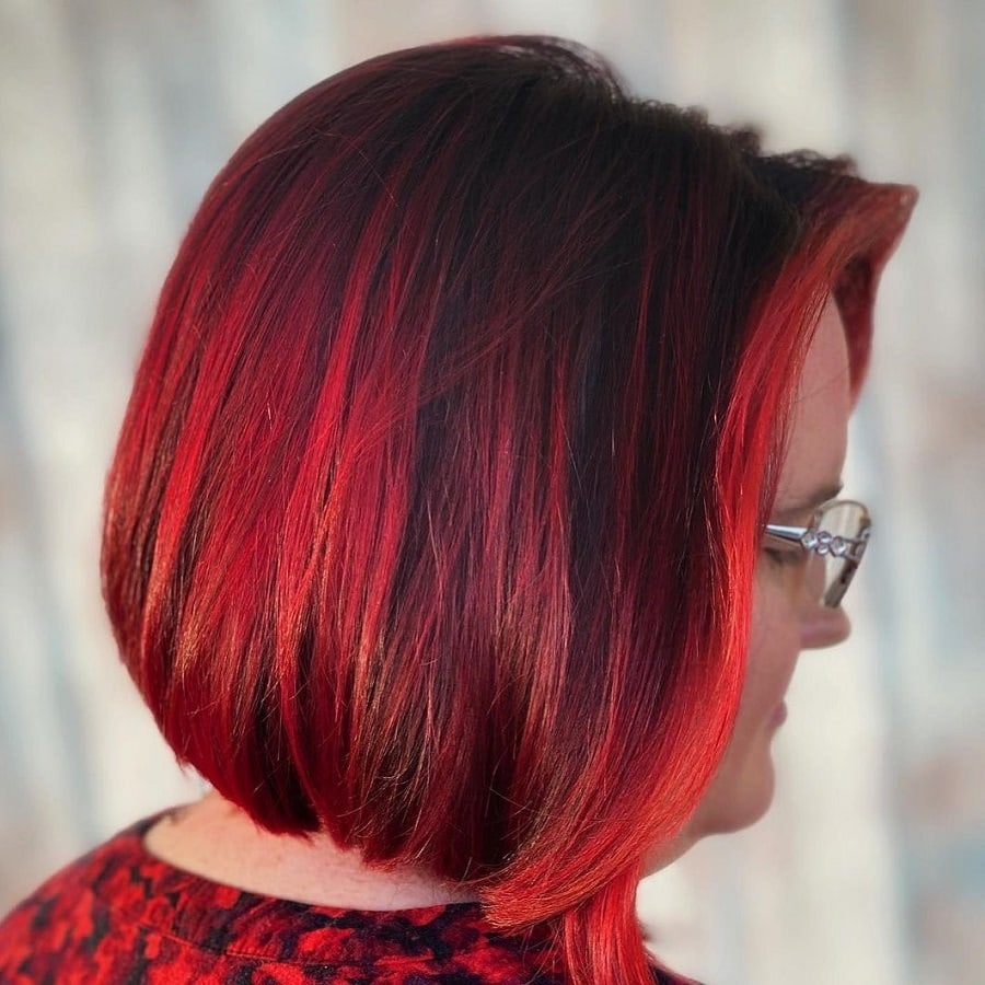 brown bob with bright red highlights