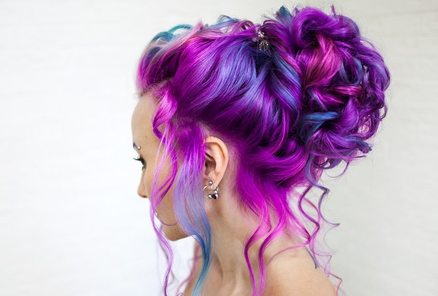 bun hairstyle for curly blue and purple hair