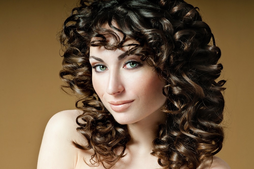 curly perm hair with bangs