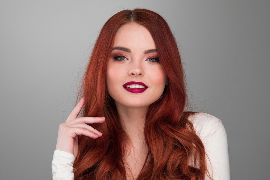 woman with dark ginger red hair