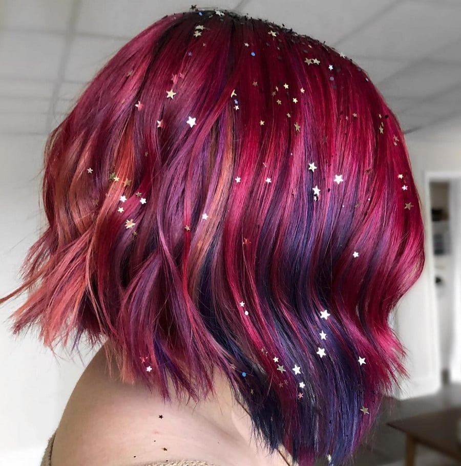 dark pink wavy bob with glitter