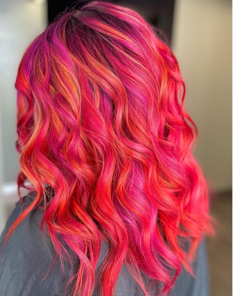 fiery magenta red wavy hair