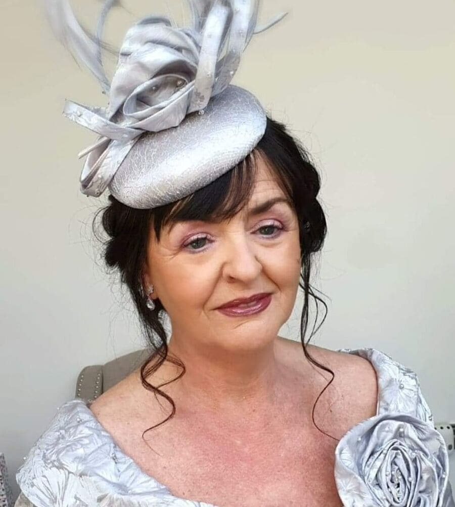 cap hairstyle for mother of the bride 