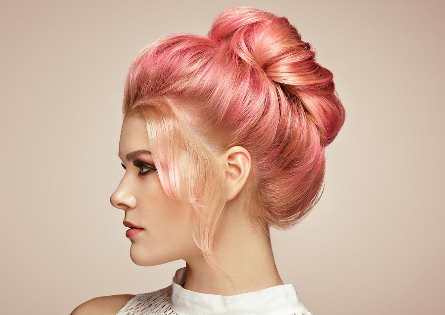 high bun updo with pastel pink hair