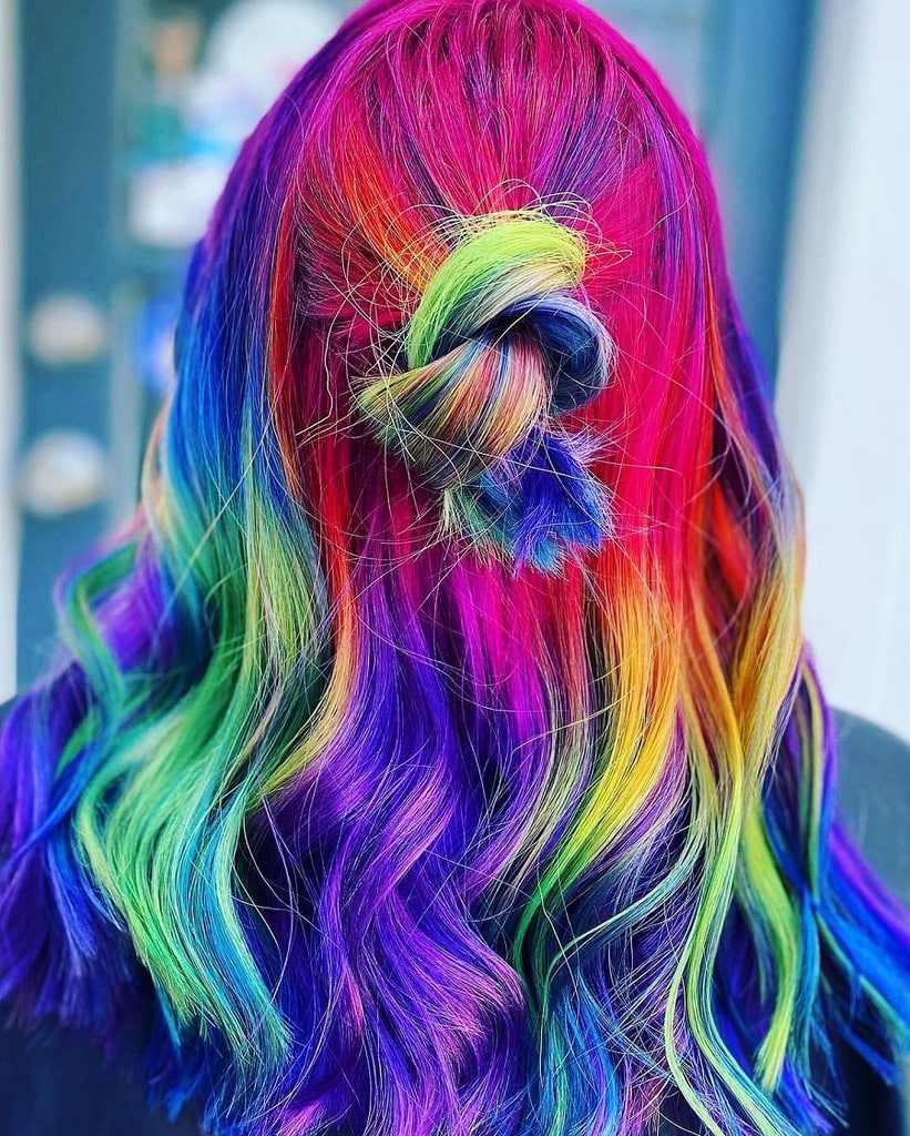 half up hairstyle with holographic hair