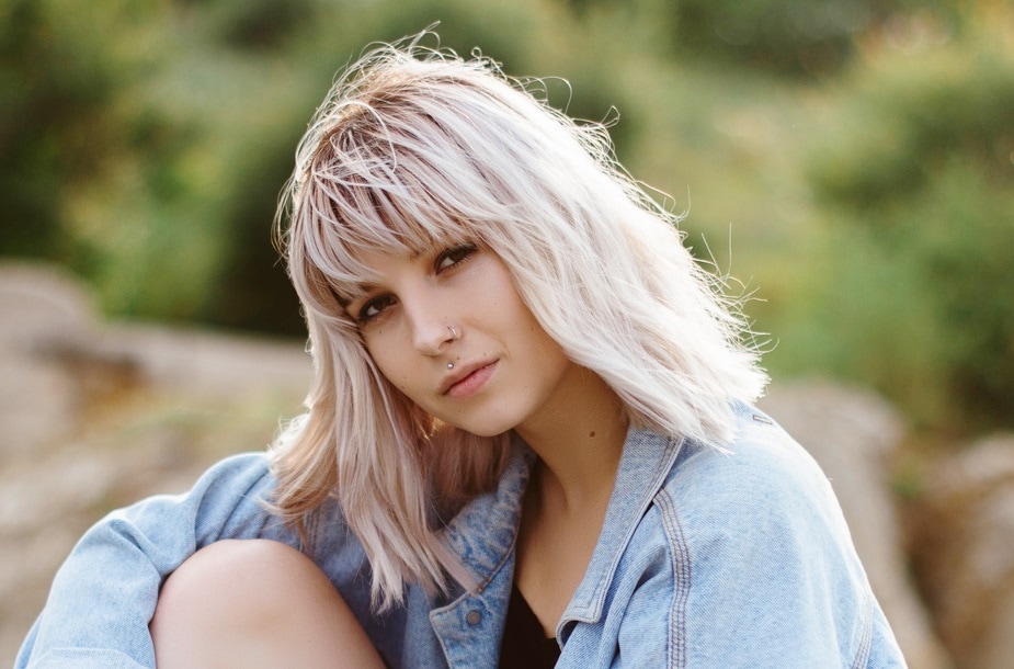 long blonde bob with bangs for beach