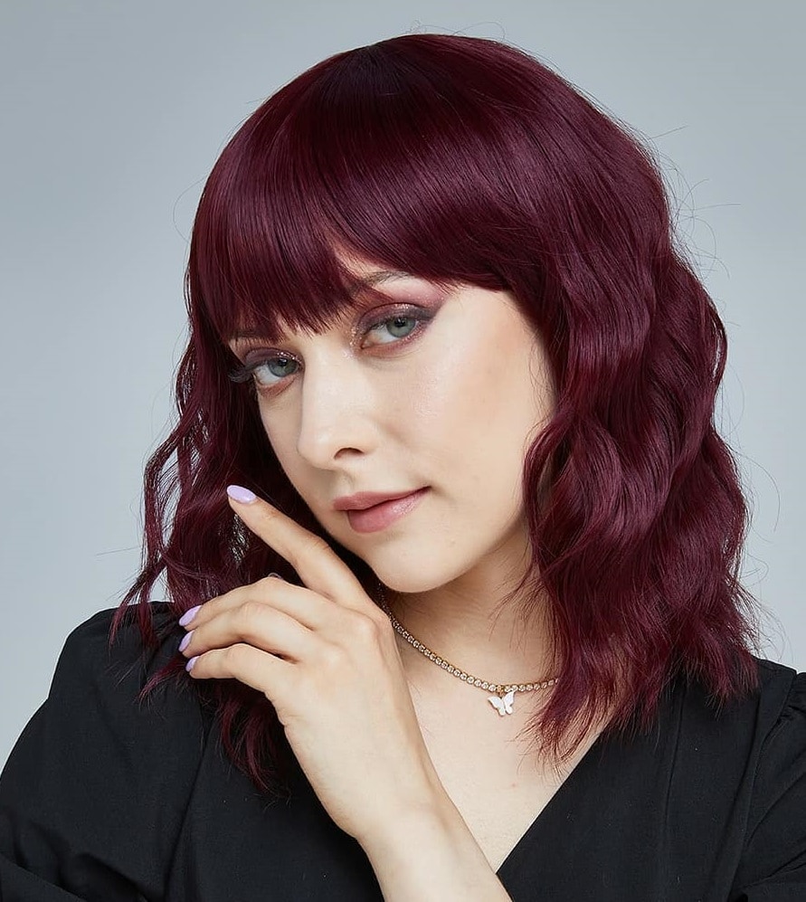 long wavy burgundy bob with bangs