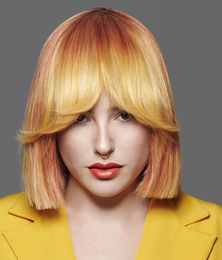 long blonde bob with feathered bangs