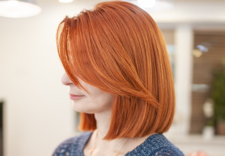 long ginger bob with layered bangs