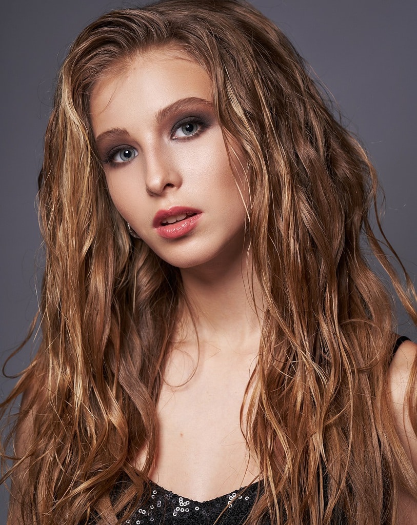 long wet hairstyle with caramel brown hair