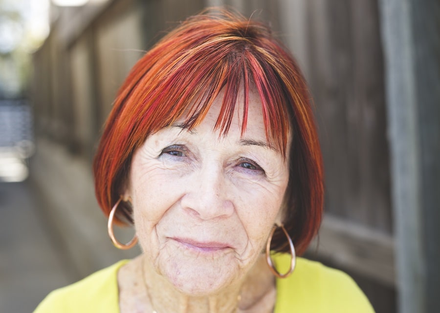 medium red bob with bangs for women over 70
