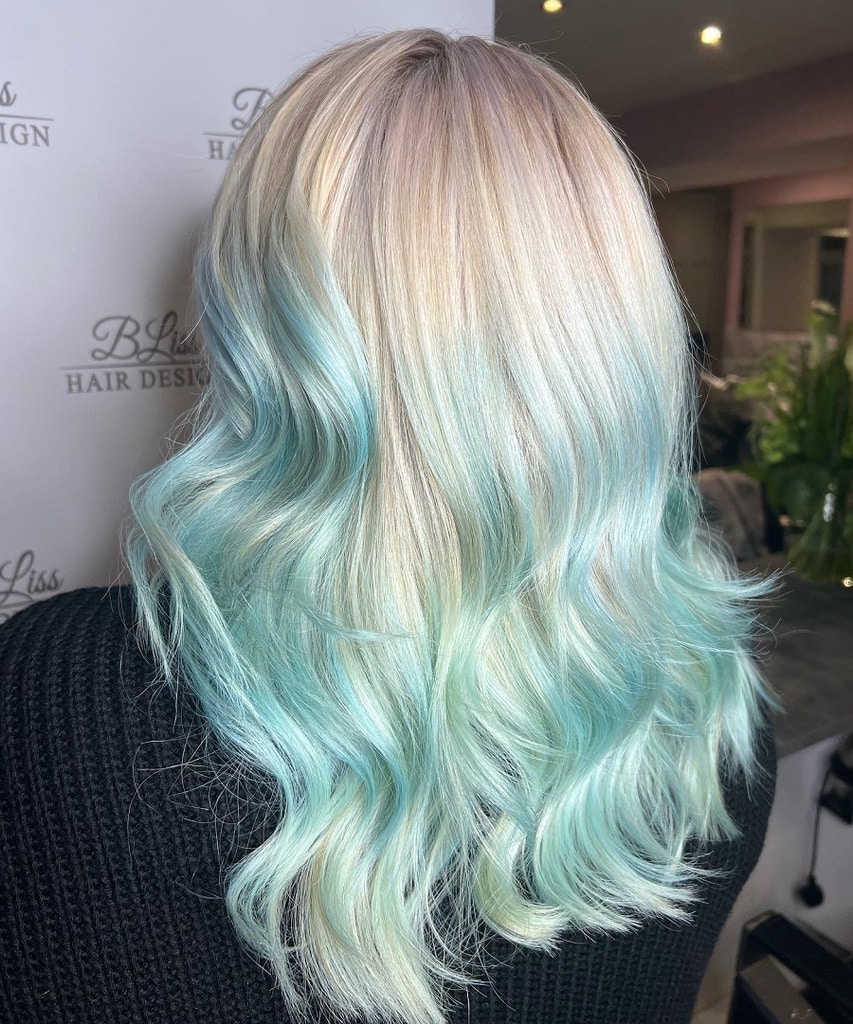 blonde wavy hair with mint green ends