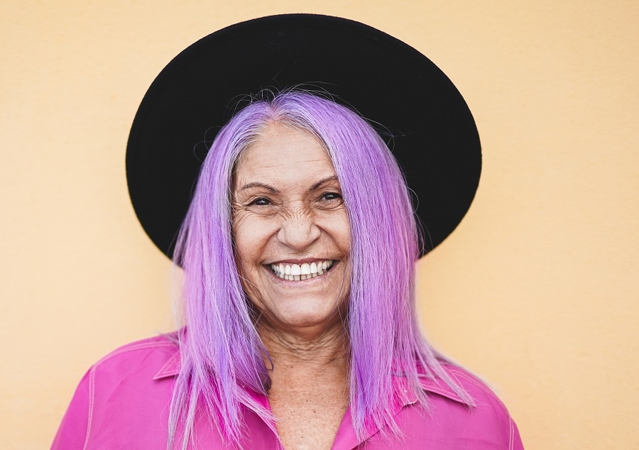 older woman with long purple hair