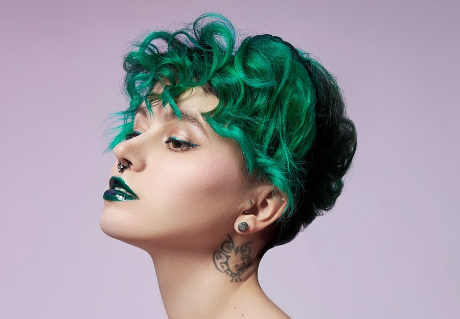 punk girl with curly short green hair