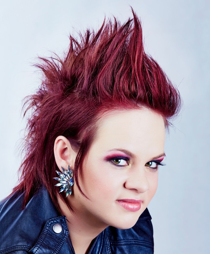 short punk hairstyle with dark red hair