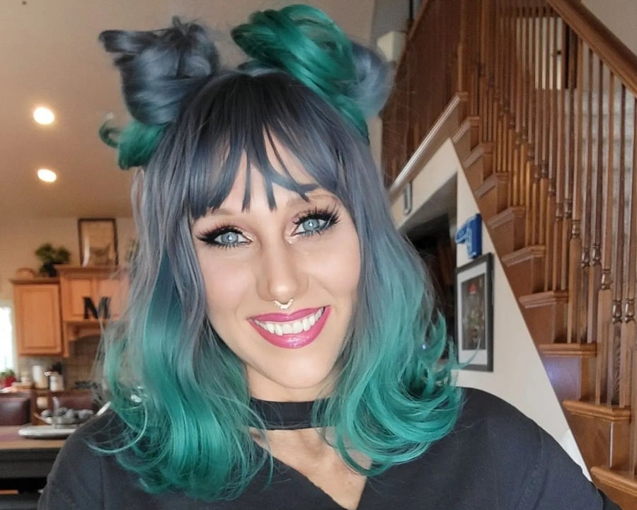 space buns with teal hair