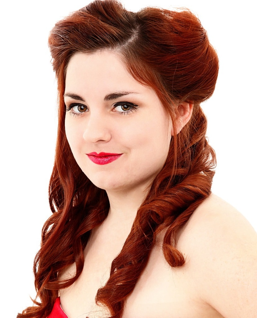 vintage hairastyle with dark auburn red hair