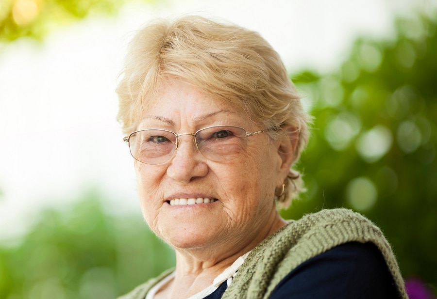 woman over 70 with short blonde hair