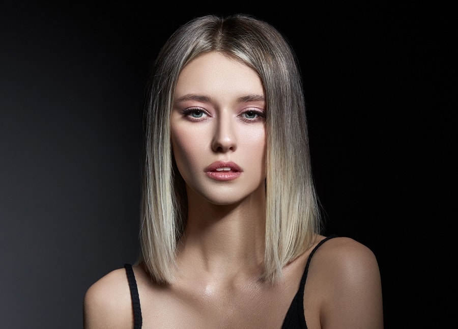 ash blonde long bob with center part