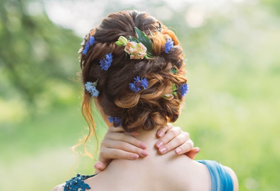 braided flower bun hairstyle for prom