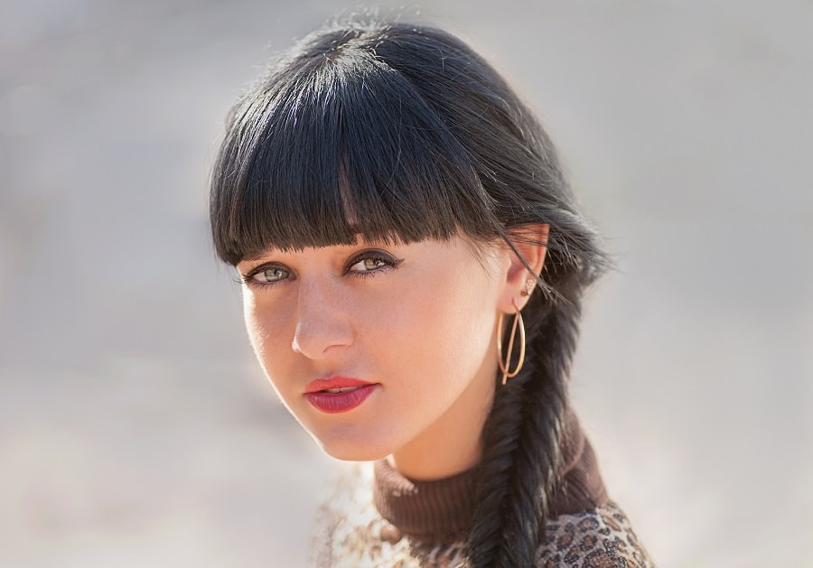 braided prom hairstyle with bangs