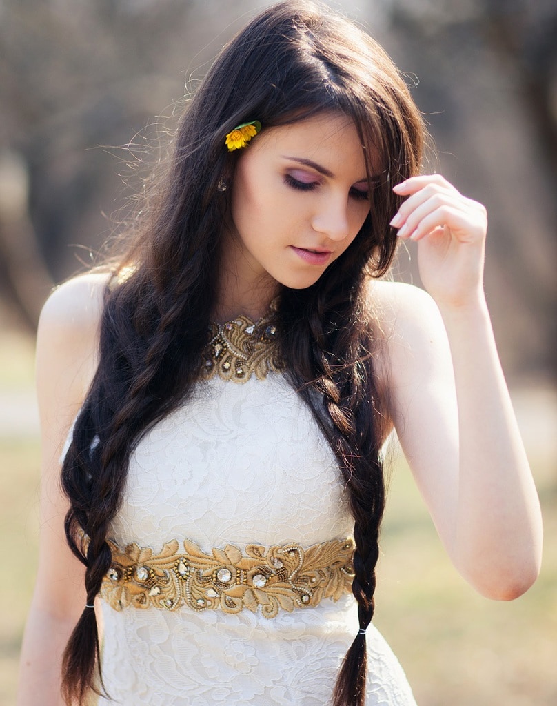 braided prom hairstyle with long brunette hair