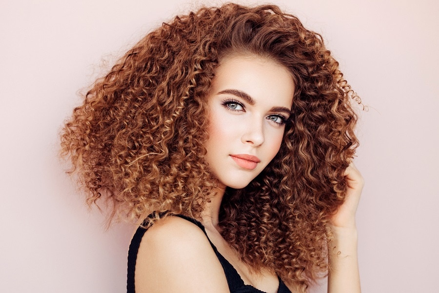 chestnut brown curly hairstyle