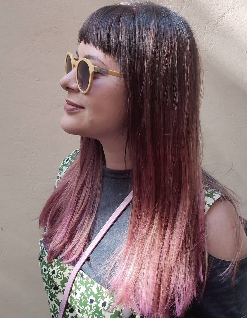 faded rose gold balayage ombre hair with bangs