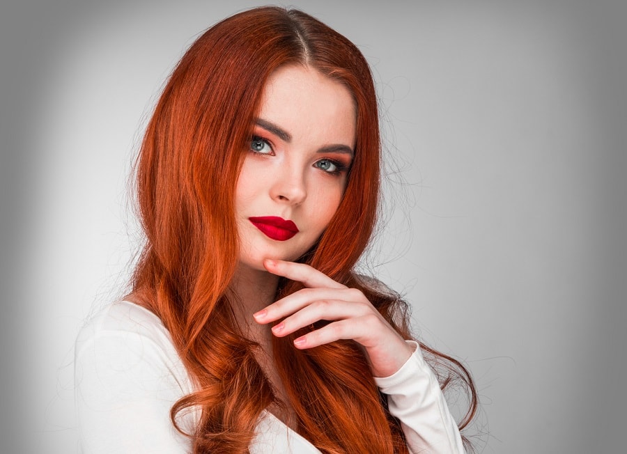 formal party hairstyle with long red hair
