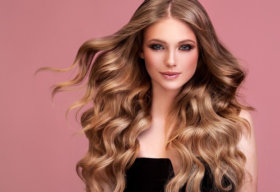 middle part wavy hairstyle for women