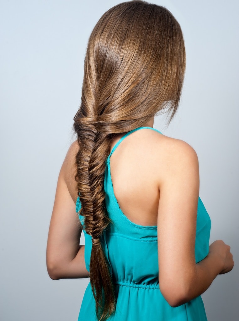 party hairstyle with long fishtail braid