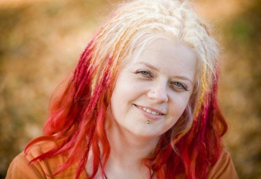 red ombre dreads with frizzy hair