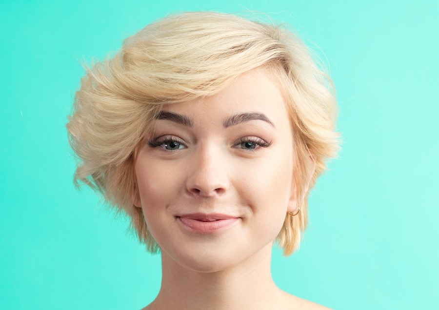 short blonde hair with feathered bangs